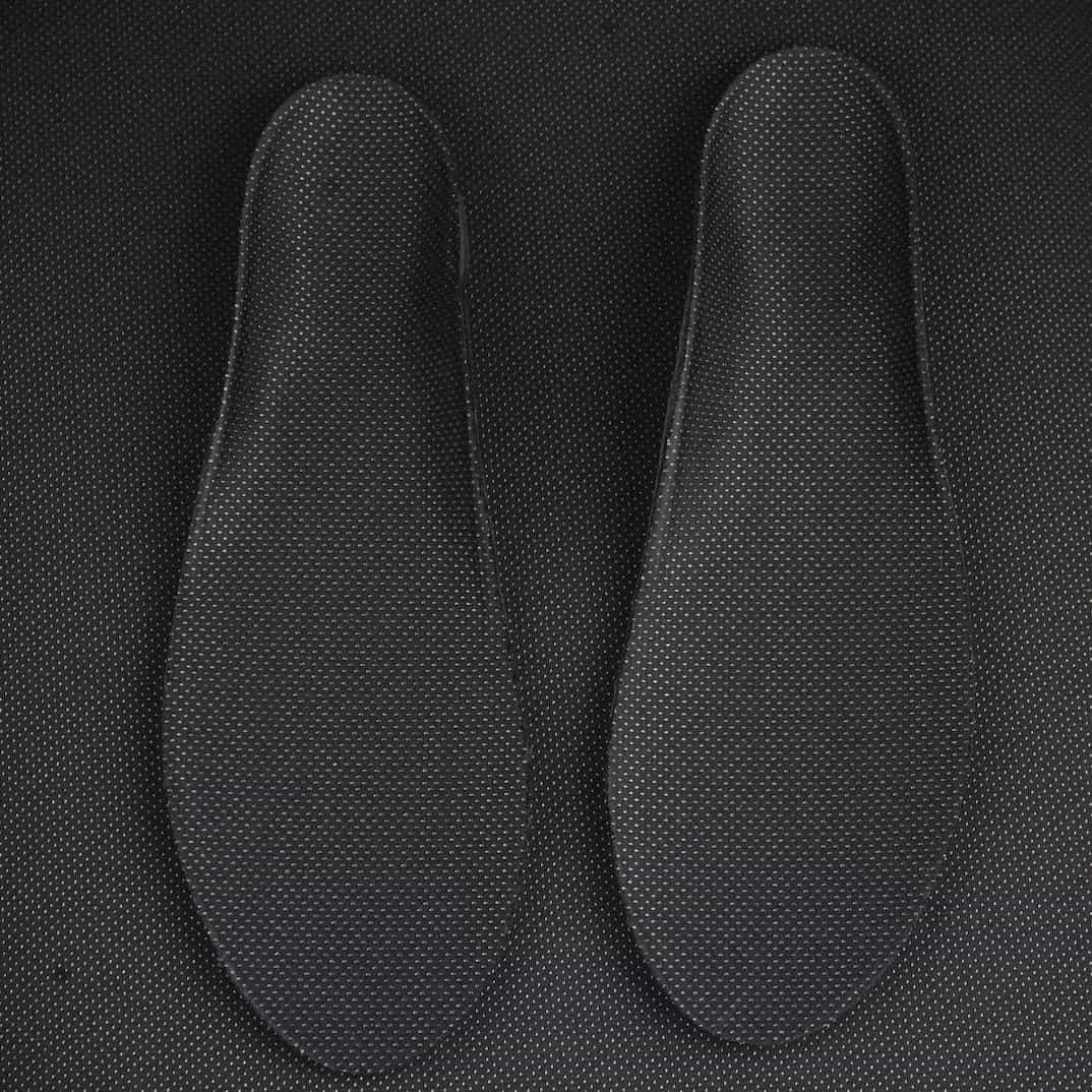 Close up image of the fabric used to line our Kicks For Gents Insoles. They are black fabric with pure silver bonded fibers that have a weave pattern.INSOLES - Kicks For Gents